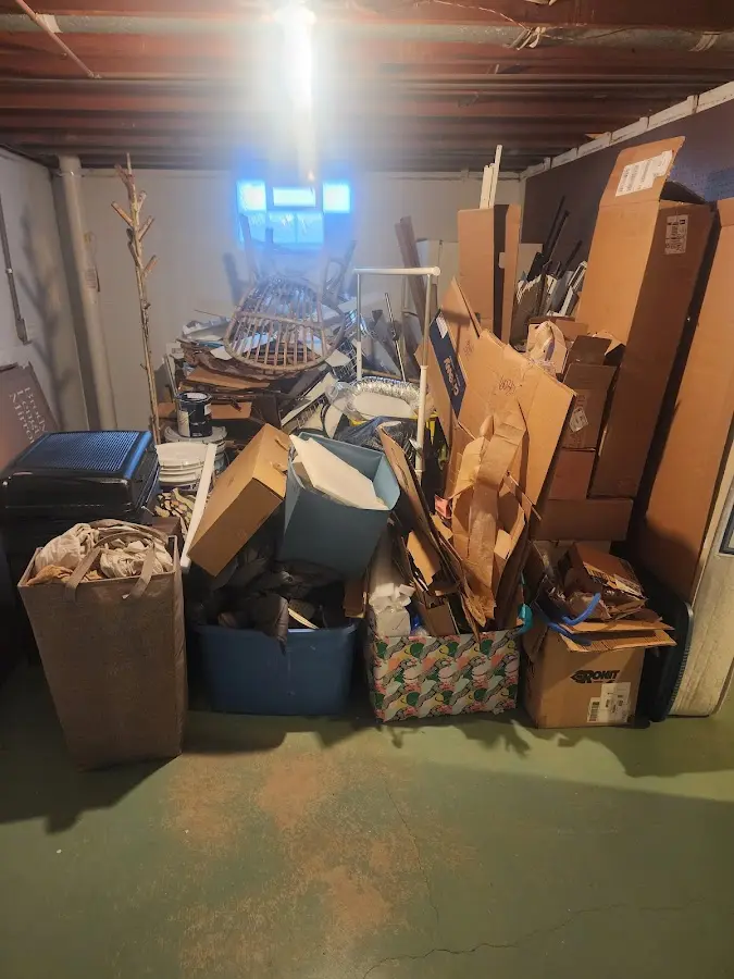 Roll-off dumpster container at job site for 8 Yard Dumpster Rental in Randleman